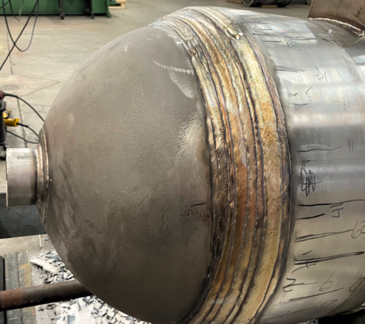 Stainless steel pressure vessel with rounded ends